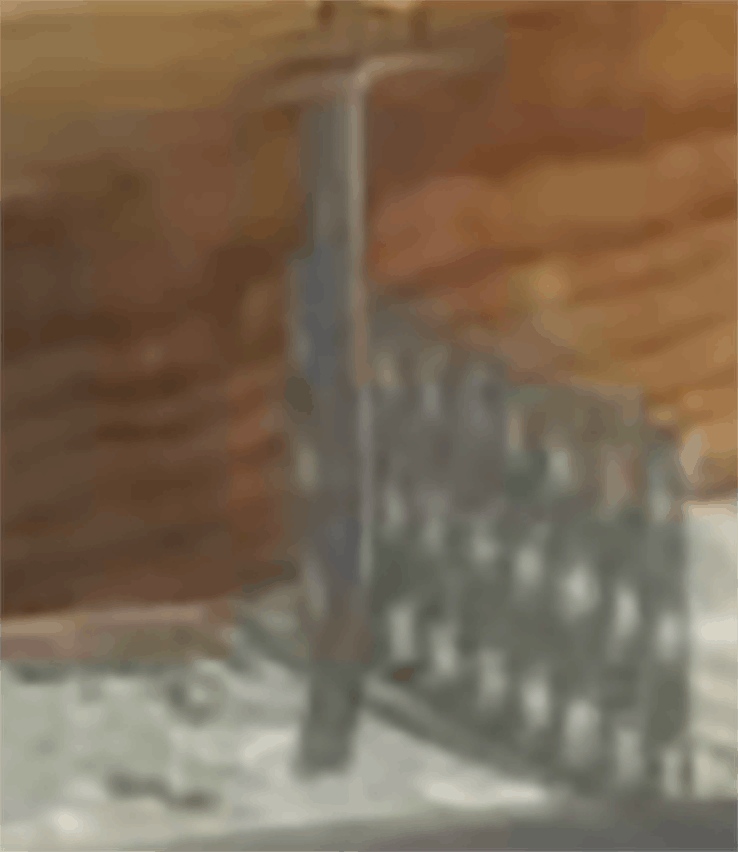 Inspector documenting a wind mitigation report with clear photos to avoid rejection